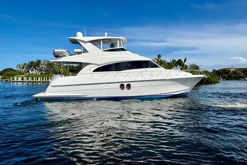 Slide: The Image of 2011 Hatteras 60 Motor Yacht cruising on a sunny day. - 47