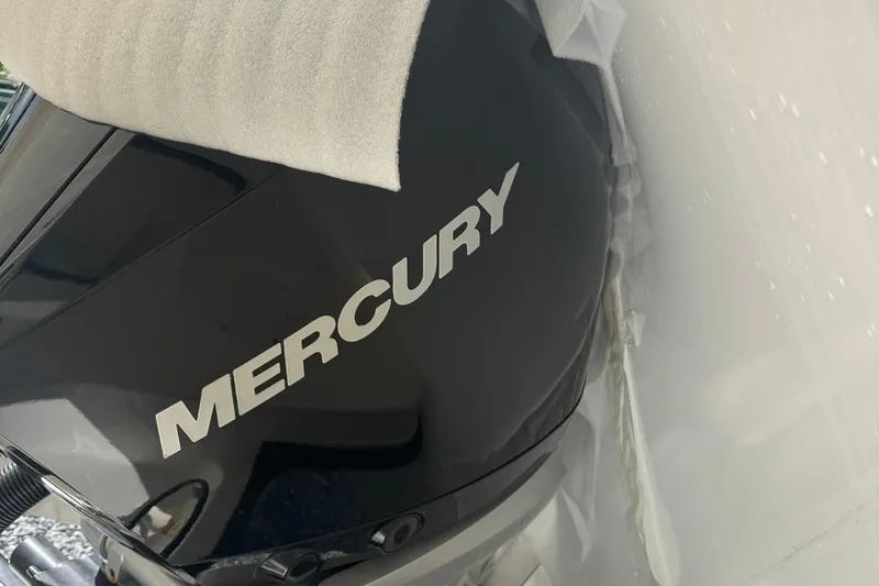 Slide: The Image of Mercury engine on a 2022 Boston Whaler 240 Vantage boat. - 11