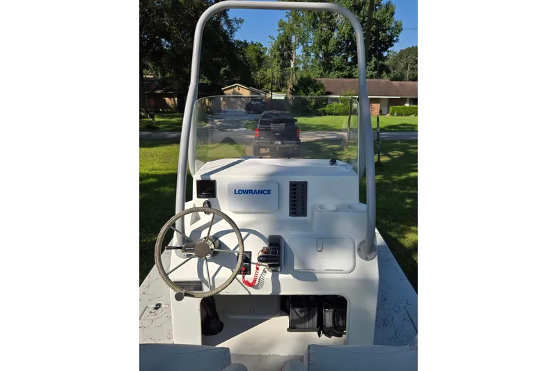 Slide: The Image of 2019 Gulf Coast Pro 22 boat console with steering wheel and Lowrance equipment. - 10