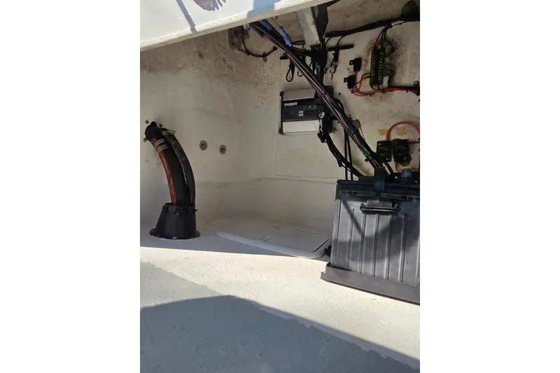 Slide: The Image of 2019 Gulf Coast Pro 22 boat interior wiring and components. - 15