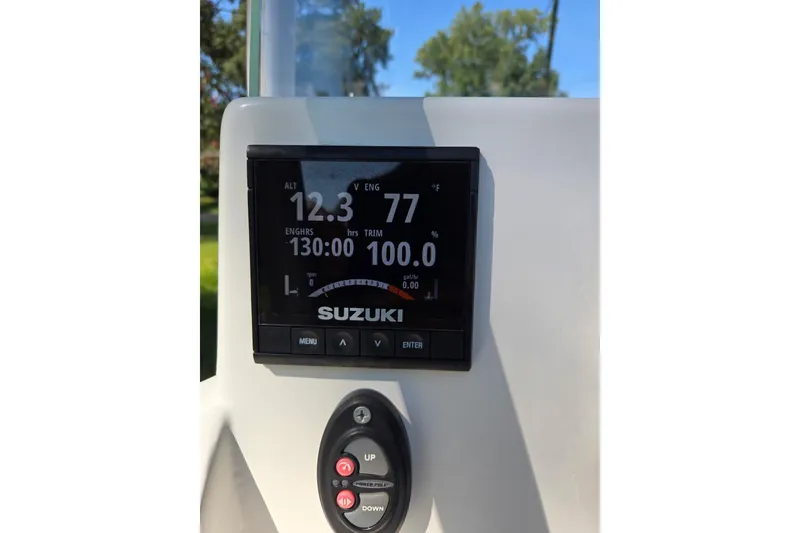 Slide: The Image of Dashboard of a 2019 Gulf Coast Pro 22 boat with Suzuki display. - 17
