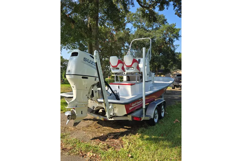 Slide: The Image of 2019 Gulf Coast Pro 22 boat with Suzuki outboard motor on trailer. - 6