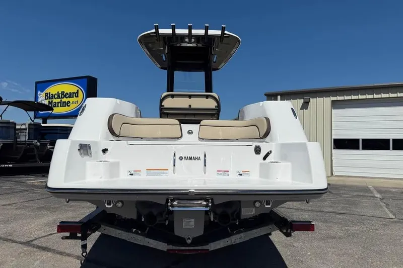 Slide: The Image of 2026 Yamaha Boats 255 FSH Sport H at BlackBeard Marine dealership, rear view. - 5