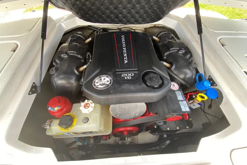 Slide: The Image of Engine compartment of 2020 Chaparral 19 SSi boat with Volvo Penta V6 200 engine. - 13