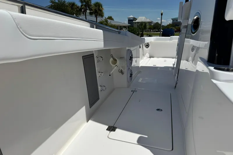 Slide: The Image of 2026 Caymas 34 CT boat interior with sleek white design and modern amenities. - 13