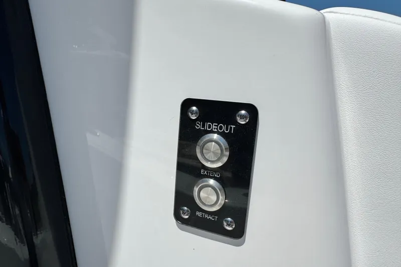 Slide: The Image of Control panel on 2026 Caymas 34 CT boat for slideout extension and retraction. - 30