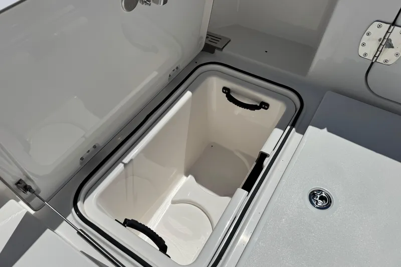 Slide: The Image of Open storage compartment on 2026 Caymas 34 CT boat, featuring a sleek design. - 32