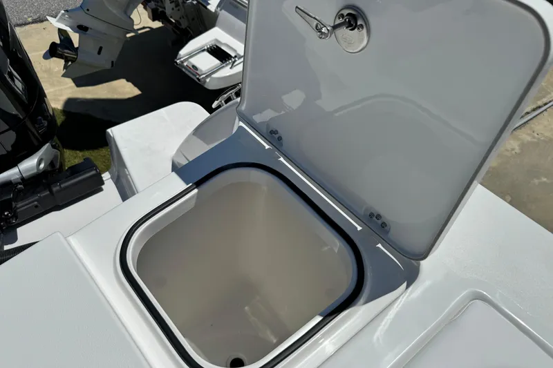 Slide: The Image of Open storage compartment on 2026 Caymas 34 CT boat, showcasing sleek design and functionality. - 33