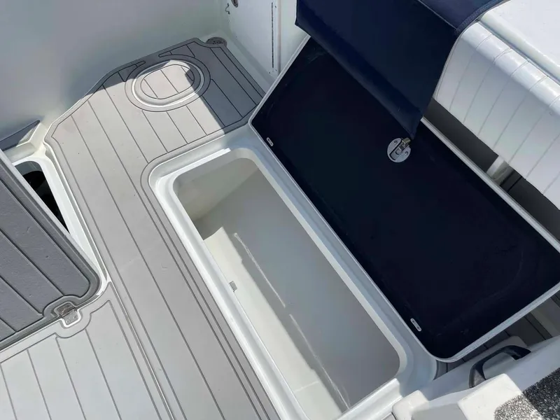 Slide: The Image of Open storage compartment on 2014 Yellowfin 42 boat deck. - 31