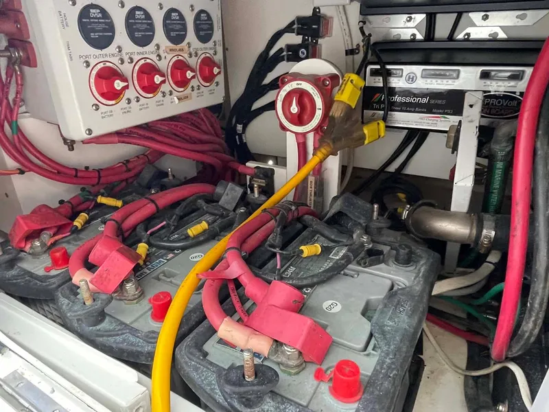 Slide: The Image of Electrical system of a 2014 Yellowfin 42 boat with batteries and wiring. - 36