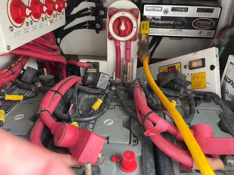 Slide: The Image of Electrical system of a 2014 Yellowfin 42 boat with cables and battery connections. - 38