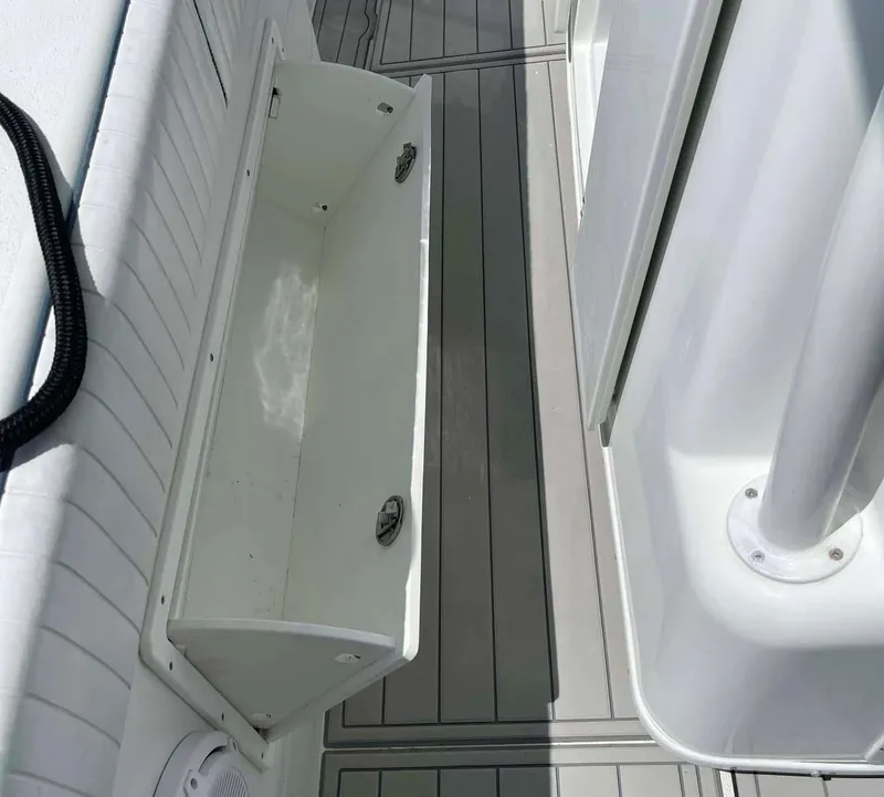 Slide: The Image of 2014 Yellowfin 42 boat deck with storage compartment and sleek design. - 41