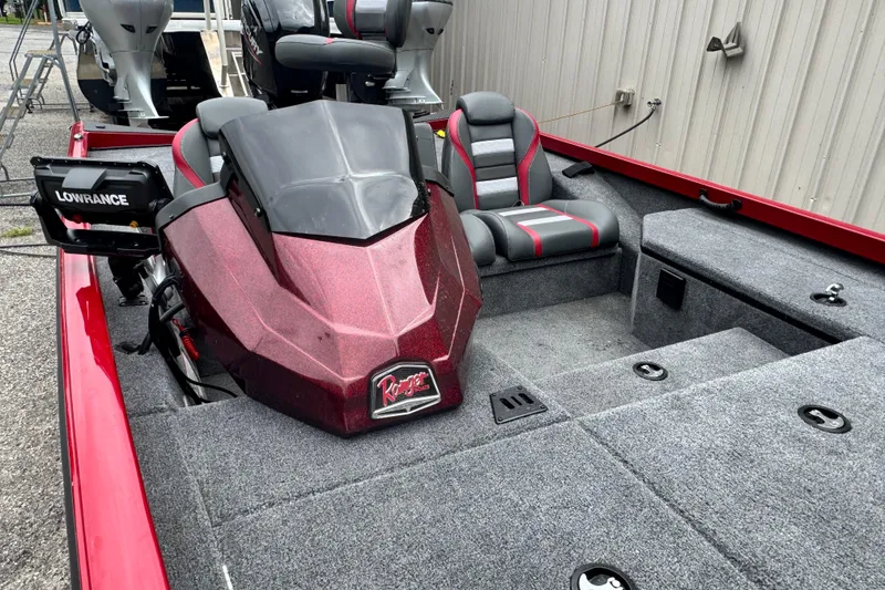 Slide: The Image of 2024 Bass Tracker RT178 boat interior with seats and Lowrance equipment. - 11