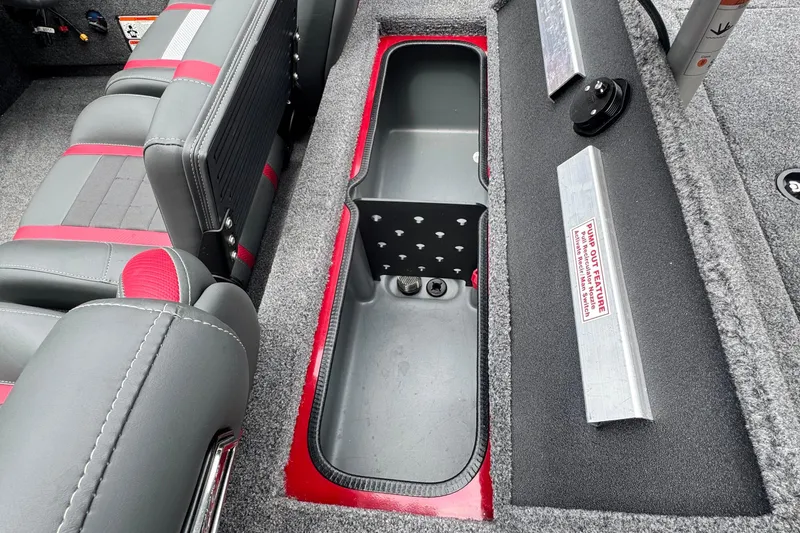 Slide: The Image of 2024 Bass Tracker RT178 boat interior with storage compartment and seating. - 19
