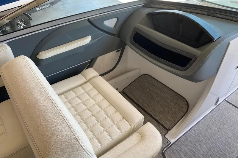 Slide: The Image of Interior of a 2021 Cobalt R3 boat with beige seating and modern design. - 5