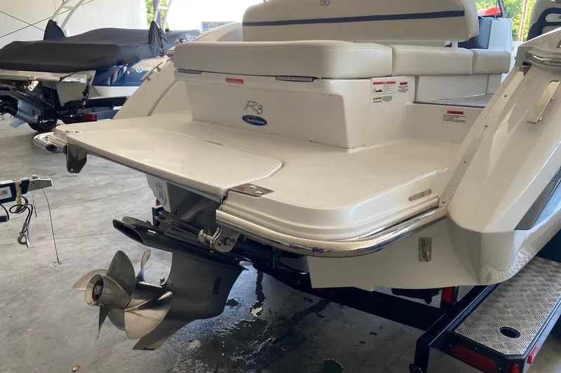 Slide: The Image of 2021 Cobalt R3 boat rear view with propeller and swim platform. - 8