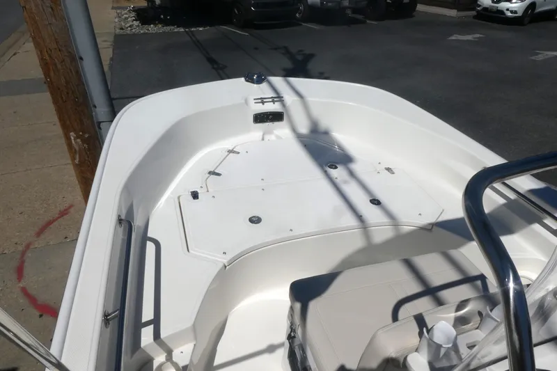 Slide: The Image of 2026 Boston Whaler 170 Montauk boat interior, featuring spacious deck and seating area. - 10