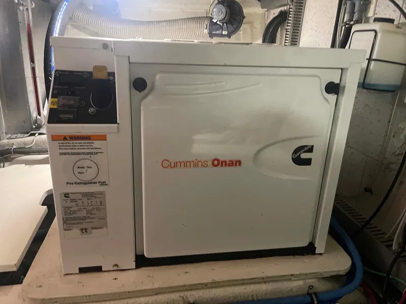 Slide: The Image of Cummins Onan generator in 1985 DeFever 40 Offshore Cruiser engine room. - 32