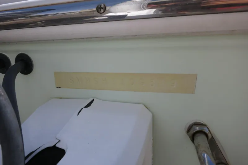 Slide: The Image of 2019 Sportsman Heritage 231 Center Console boat identification number on hull. - 10