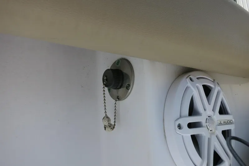 Slide: The Image of 2019 Sportsman Heritage 231 Center Console speaker and power outlet detail. - 26