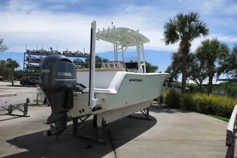 Slide: The Image of 2019 Sportsman Heritage 231 Center Console boat with Yamaha engine on display. - 7
