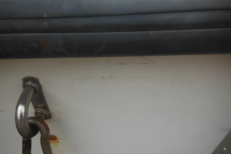 Slide: The Image of Close-up of Boston Whaler 18 Ventura Bowrider 2000 hull identification number. - 6