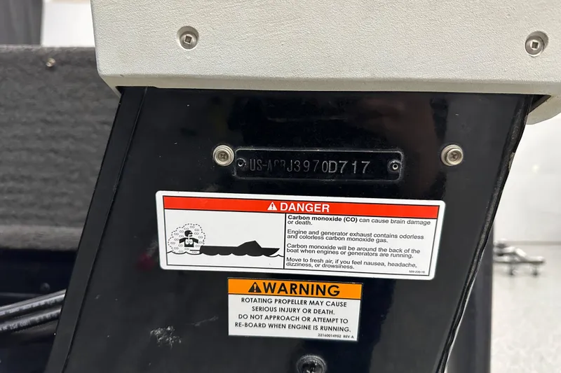 Slide: The Image of 2017 Alumacraft Trophy 185 warning labels and serial number on boat's transom. - 15