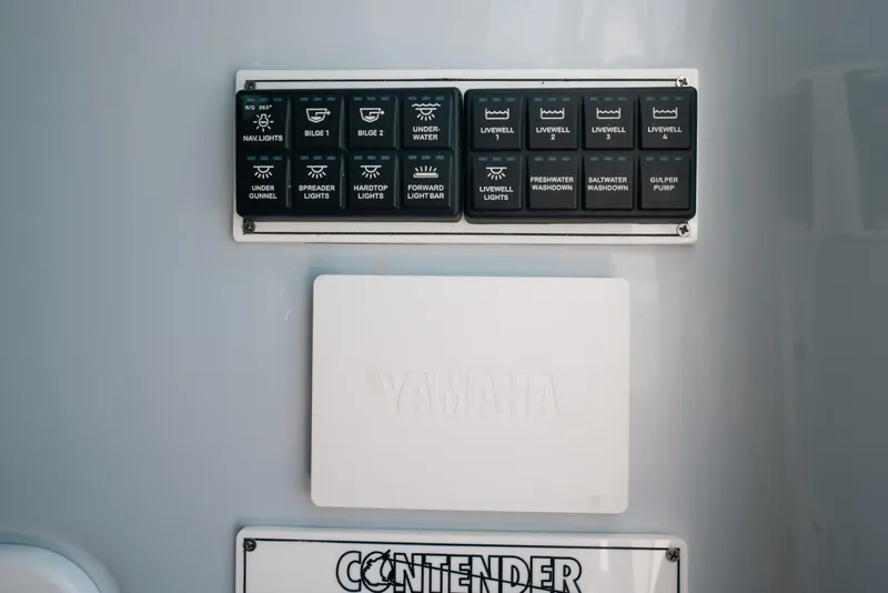 Slide: The Image of Control panel on 2025 Contender 44 ST boat with Yamaha branding. - 33