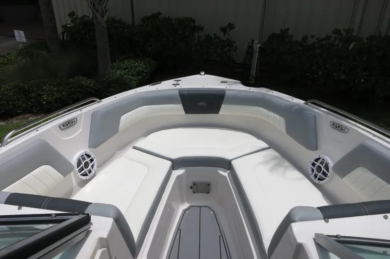 Slide: The Image of 2023 Chaparral 23 SSi OB boat interior with spacious seating and modern design. - 11