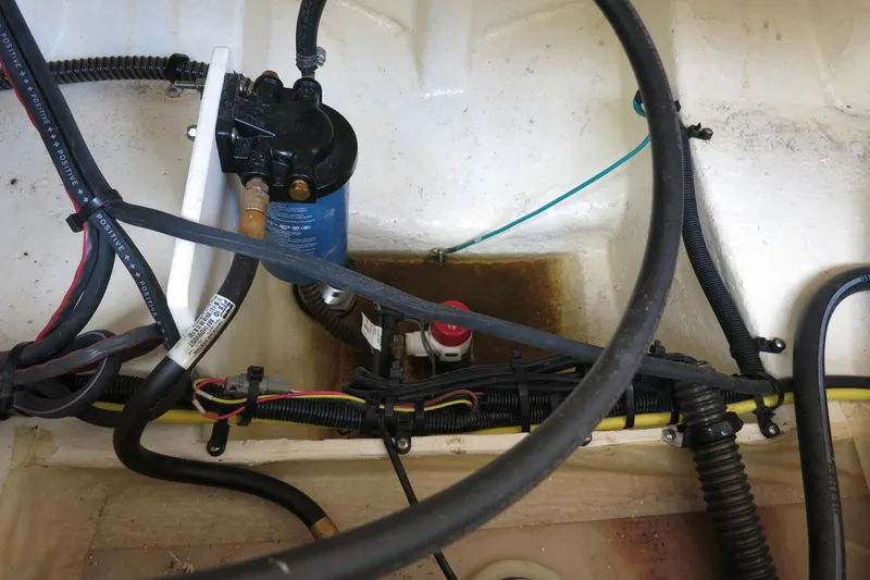 Slide: The Image of Engine compartment of 2023 Chaparral 23 SSi OB with wiring and components visible. - 32