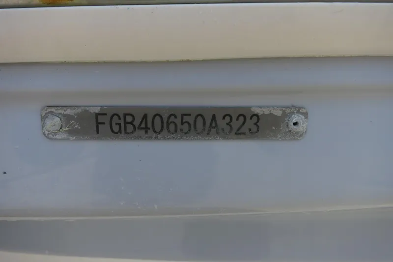 Slide: The Image of 2023 Chaparral 23 SSi OB boat hull identification number plate. - 9
