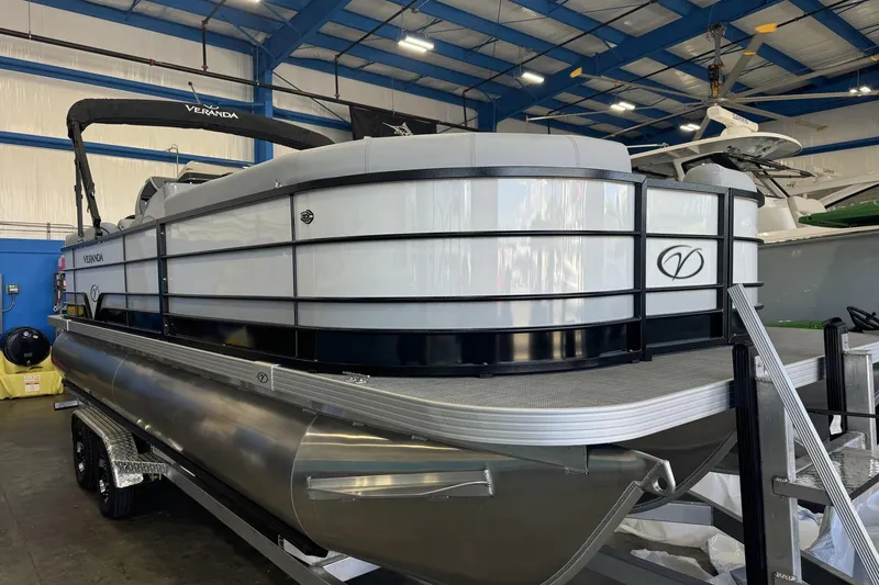Slide: The Image of 2025 Veranda Vista Sport VS 22 RC pontoon boat in a showroom setting. - 6