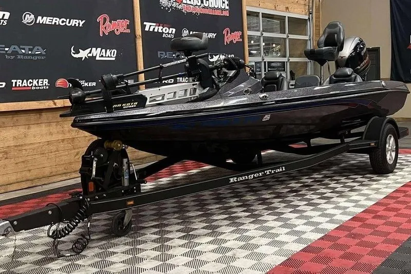 Slide: The Image of 2016 Ranger Z175 boat on trailer in showroom with branded backdrop. - 3