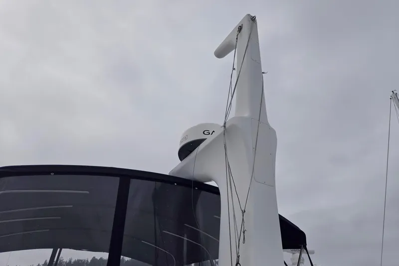 Slide: The Image of Radar and mast of 1993 Ocean Alexander 423 Classicco against cloudy sky. - 10