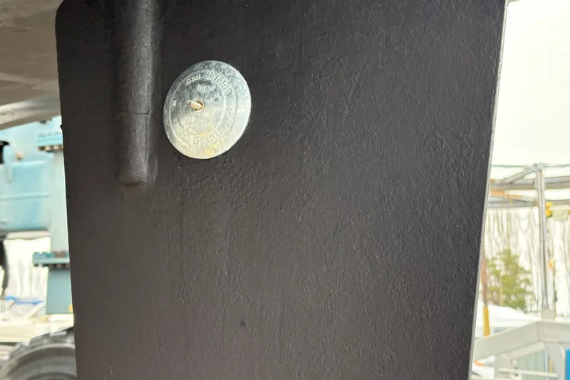 Slide: The Image of Close-up of Ocean Alexander 423 Classico 1993 hull with metal fitting. - 14