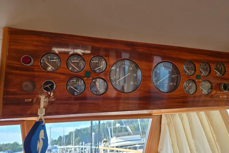 Slide: The Image of 1993 Ocean Alexander 423 Classicco dashboard with gauges and controls in wooden panel. - 38