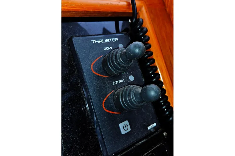 Slide: The Image of Control panel of 1993 Ocean Alexander 423 Classicco boat with thruster joysticks. - 41