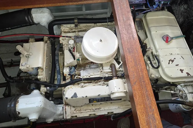 Slide: The Image of Engine compartment of a 1993 Ocean Alexander 423 Classicco yacht, featuring a Caterpillar engine. - 45