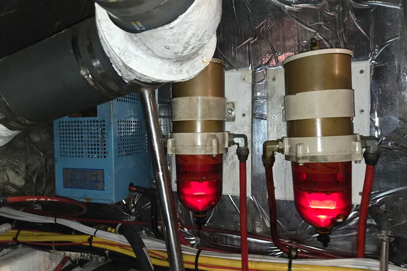 Slide: The Image of Engine room of 1993 Ocean Alexander 423 Classicco with fuel filters and piping. - 53