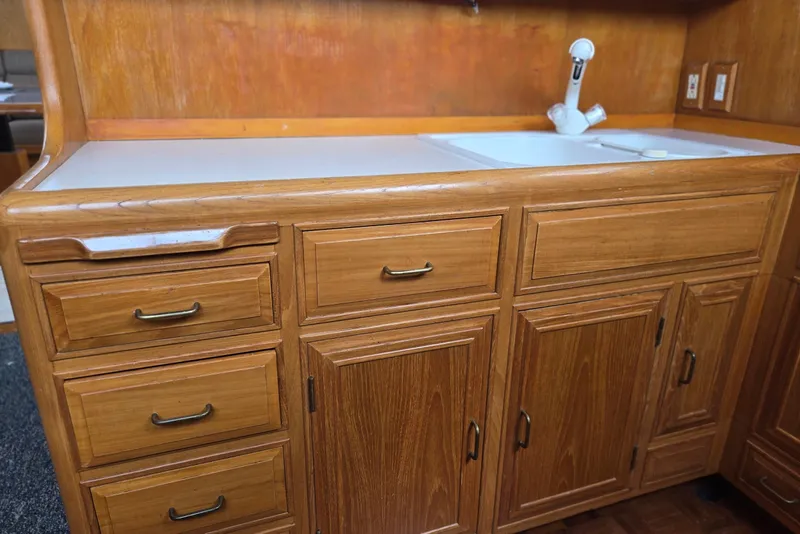 Slide: The Image of Wooden cabinetry and sink in 1993 Ocean Alexander 423 Classicco yacht interior. - 66