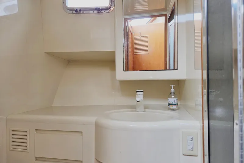 Slide: The Image of Bathroom interior of 1993 Ocean Alexander 423 Classicco yacht, featuring sink and mirror. - 72