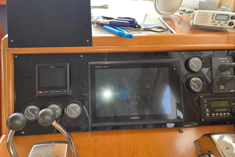 Slide: The Image of Control panel of a 1993 Ocean Alexander 423 Classicco yacht with Garmin GPS and gauges. - 39