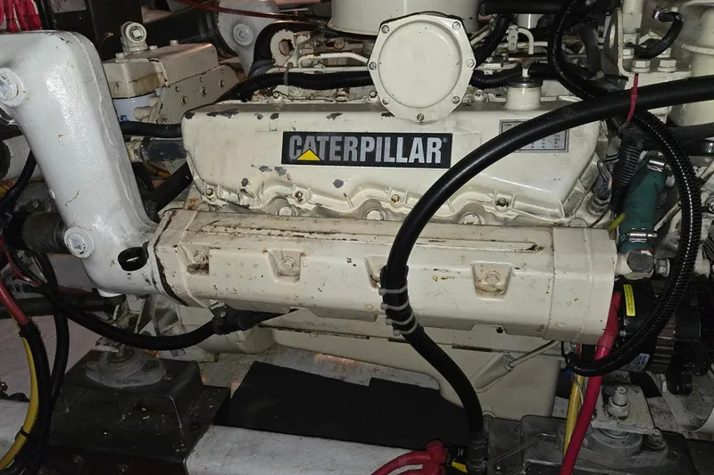 Slide: The Image of Engine of 1993 Ocean Alexander 423 Classicco with Caterpillar branding. - 48