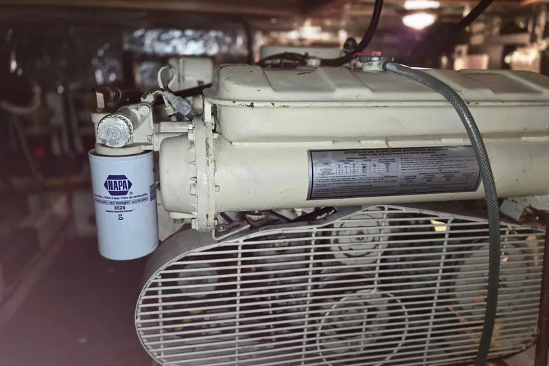 Slide: The Image of Engine compartment of 1993 Ocean Alexander 423 Classicco with NAPA filter visible. - 50