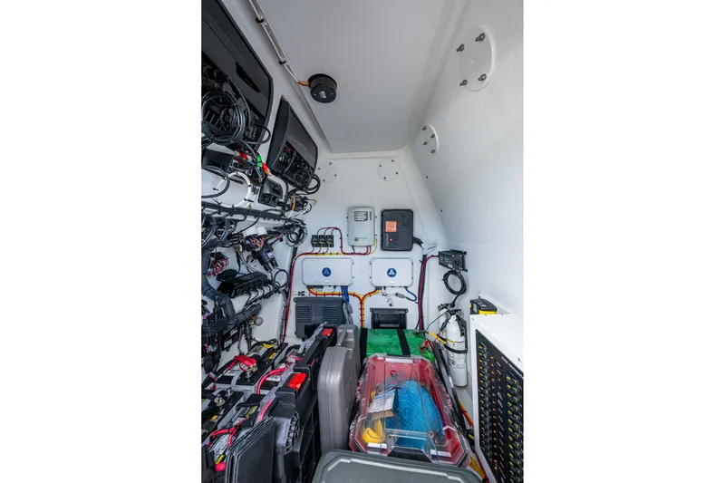Slide: The Image of Interior view of 2022 Freeman 34VH boat's electrical and storage compartment. - 23