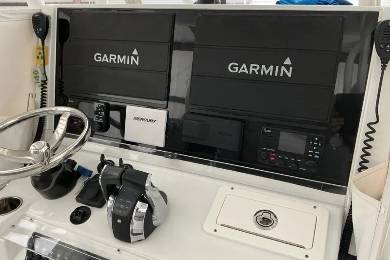 Slide: The Image of Control panel of 2022 Freeman 34VH boat with Garmin navigation system. - 64