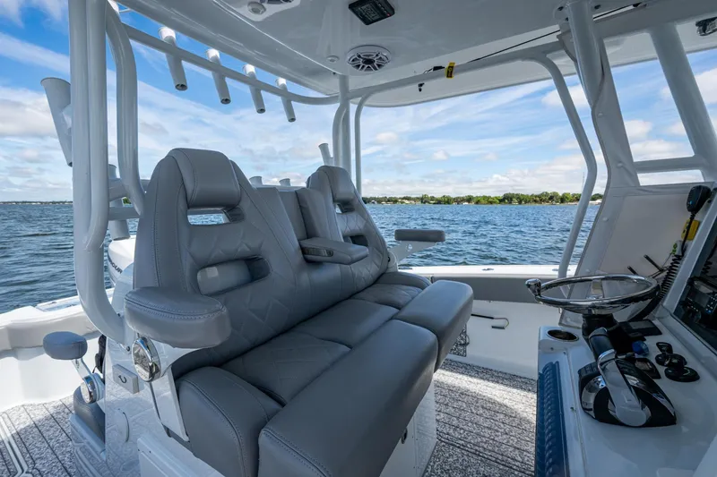 Slide: The Image of Luxurious interior of 2022 Freeman 34VH boat with plush seating and modern controls. - 9