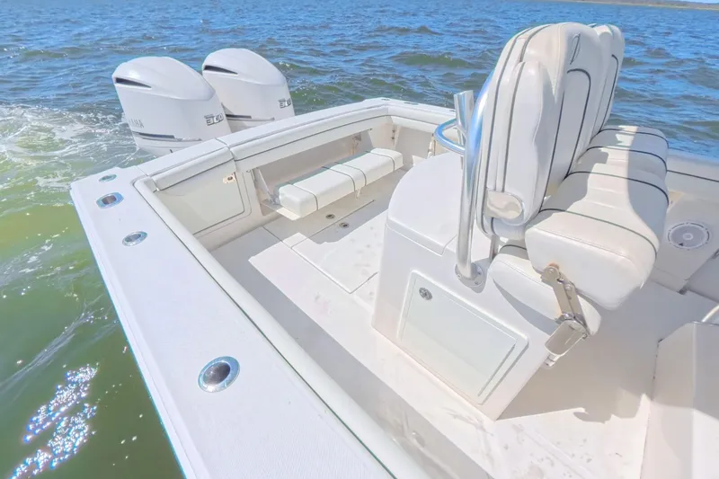Slide: The Image of 2014 Jupiter 30 FS boat with dual engines on open water. - 16