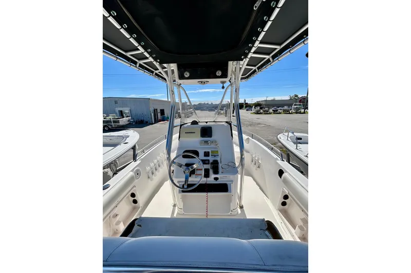 Slide: The Image of 2006 Century 2200 Center Console boat interior with steering wheel and controls. - 7