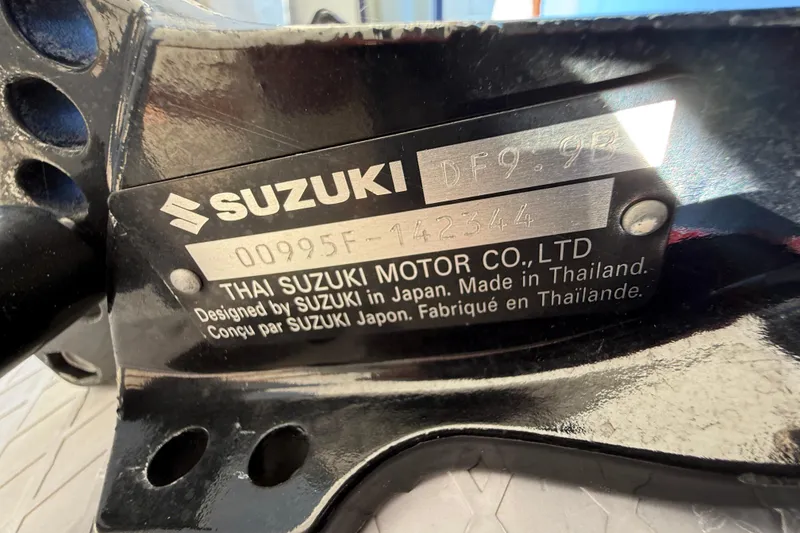 Slide: The Image of Close-up of Suzuki motor label on 2020 Highfield Classic 310 boat. - 10